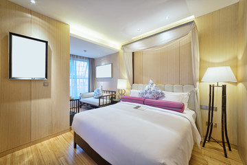 Naklejka na ściany i meble interior of modern bedroom with comfortable bed and sofa