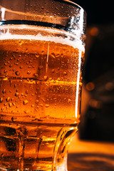 close-up mug of light beer