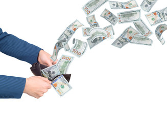dollar notes flying in an open wallet