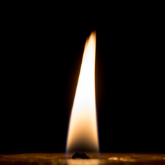 Candle flame isolated on black background