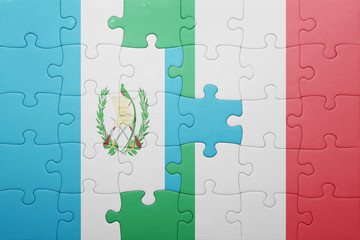 puzzle with the national flag of italy and guatemala