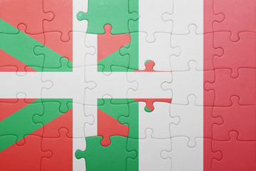 puzzle with the national flag of italy and basque country