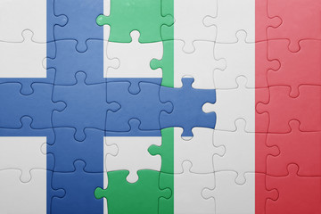 puzzle with the national flag of italy and finland