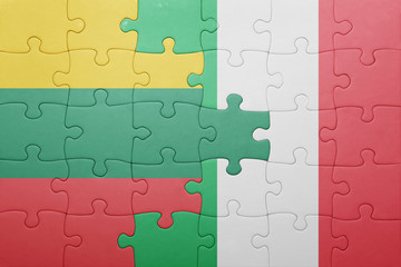 puzzle with the national flag of italy and lithuania