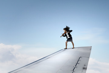 On wing of flying airplane