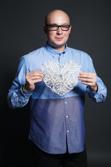 Valentin's day greetings - studio portrait with heart shape