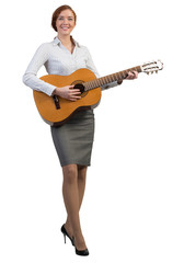 Obraz premium Businesswoman with guitar