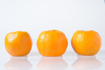 Orange fruit on white background.