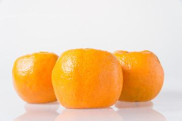 Orange fruit on white background.