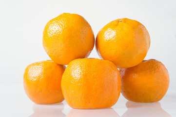 Orange fruit on white background.