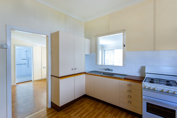 Detail of a kitchen connected with a room