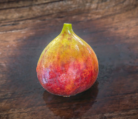 ripe brown turkey figs on teak wooden