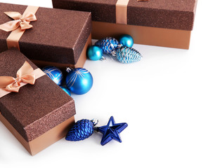 Beautiful brown Christmas gifts with toys isolated on white background