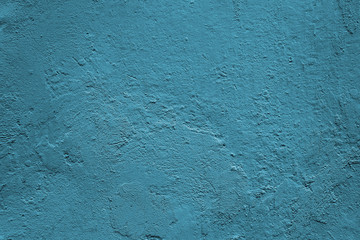 Blue background. Grunge texture. Blue wall.