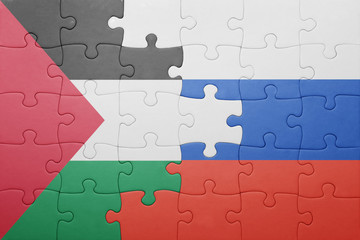 Fototapeta premium puzzle with the national flag of palestine and russia