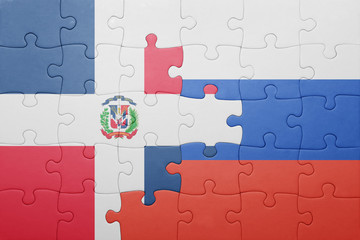 puzzle with the national flag of dominican republic and russia