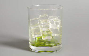Glass with ice cubes