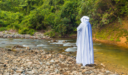Jesus Standing By River