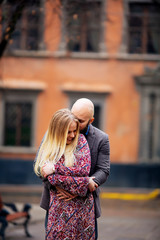 Fototapeta premium A young couple in love outdoor life in the city
