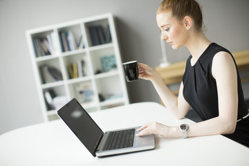 Young woman working in the office