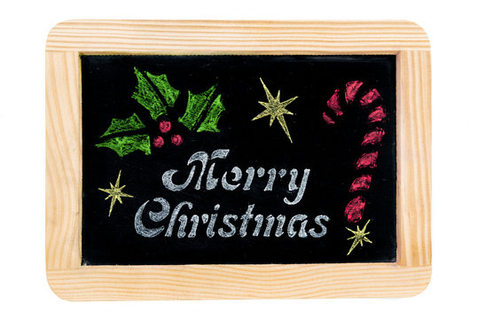Wooden frame vintage chalkboard with Merry Christmas message and hand drawing symbols isolated on white