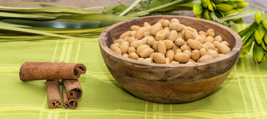 Peanuts. American peanuts with a wooden bowl 