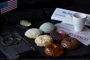 a set of donuts on the table detective