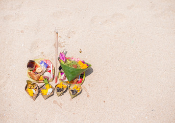 Balinese offering on the beach