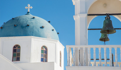 A Greek Orthodox church and bell tower near Fira town on the island of Santorini