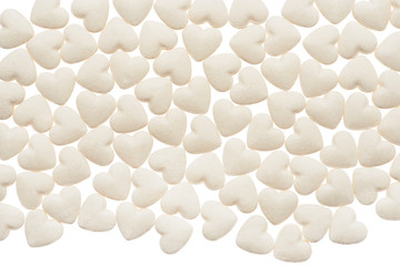 White heart shape tablets isolated on white background