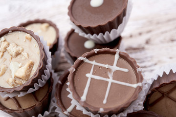 Dark chocolate on wooden background