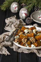 Salad with pumpkin, walnuts and blue cheese      