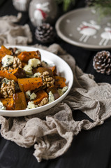 Salad with pumpkin, walnuts and blue cheese      