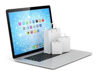 laptop and  shopping pags on white background