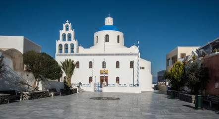 A bell tower at a Greek Orthodox church in the square at Oia town on the island of Santorini