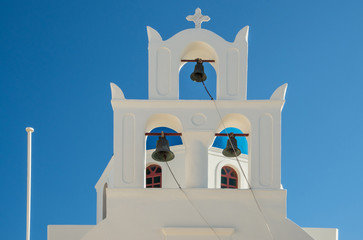 A bell tower at a Greek Orthodox church in Oia town on the island of Santorini