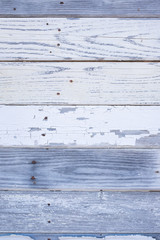 Naklejka premium Wood Wall With Peeling White Paint and Bleached Wood