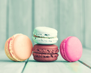 Colorful macaroons over vintage turquoise wood