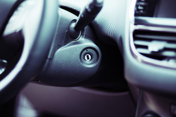 Close up shot of the ignition keyhole in a car