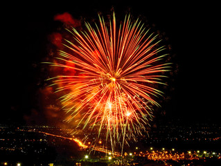 Fireworks on night city background