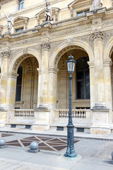 Architecture with columns and light post, Paris, France