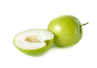 whole and half cut fresh Jujube on white background