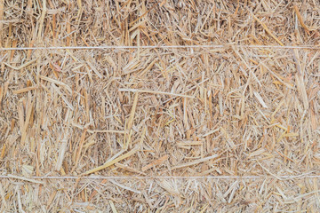 Yellow straw wall texture background