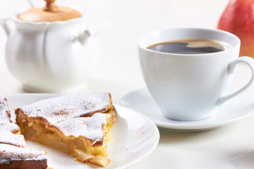delicious pear tart with coffee on the table