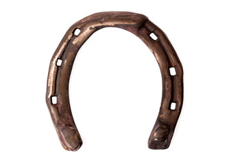 Rusty old horseshue isolated on white