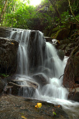Fototapeta na wymiar Small waterfall in the rainy season