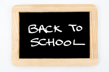 Obraz premium Vintage Chalkboard with wooden frame isolated on white, message Back To School