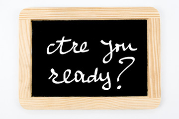 Obraz premium Vintage Chalkboard with wooden frame isolated on white, message Are You Ready