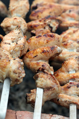 Chicken on the grill to cook