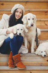 Portrait of the young woman with favourite dogs
